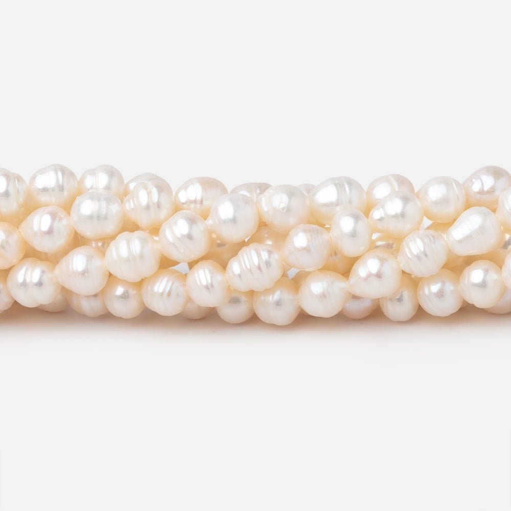 4-5mm Creamy Petite Ringed Baroque Freshwater Pearls 16 inch 78 Beads - Beadsofcambay.com