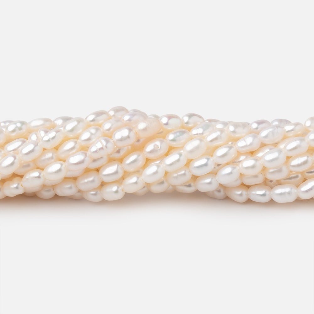 4-5mm Creamy Straight Drill Oval Freshwater Pearls 15.25 inch 85 Beads - Beadsofcambay.com