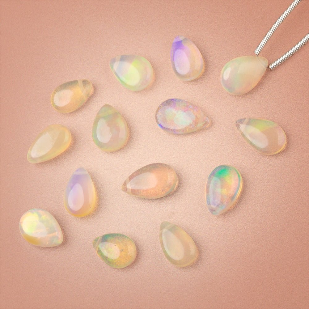 9 - 10mm Ethiopian Opal Plain Pear 1 Focal Bead AAA - Beadsofcambay.com