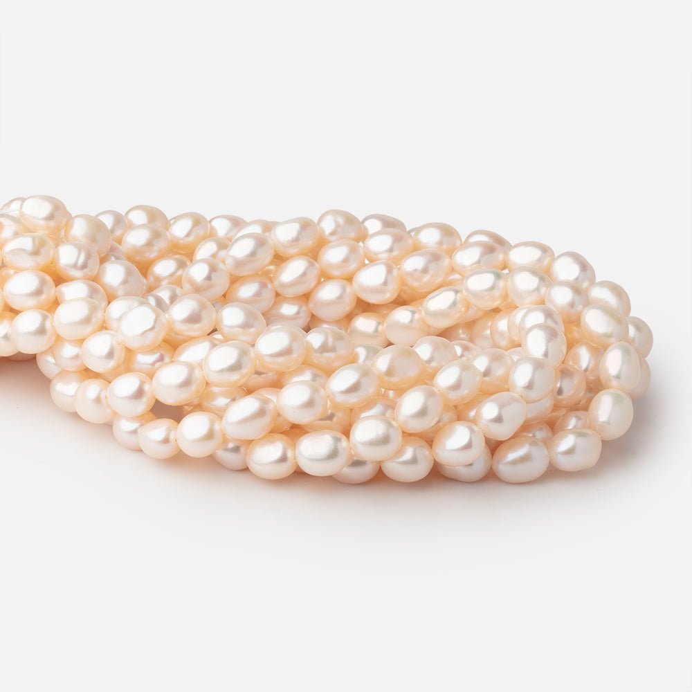9 - 11mm Creamy Peach Baroque Freshwater Pearls 15.5 inch 38 Beads - Beadsofcambay.com