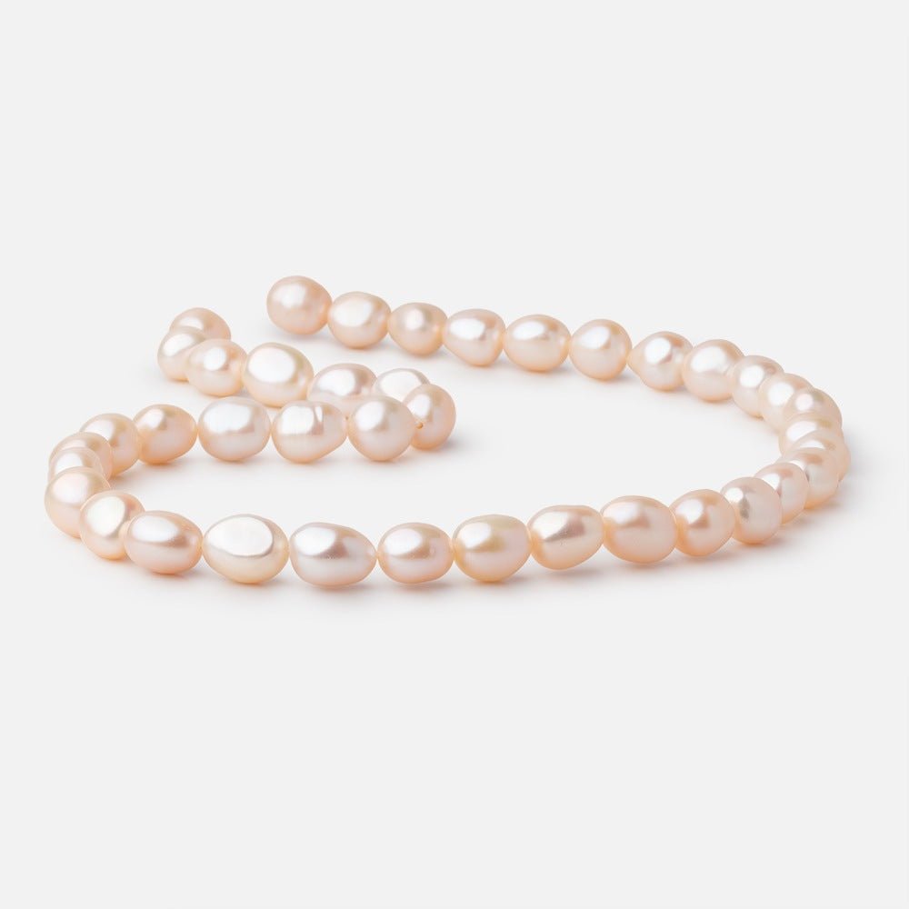 9.5 - 10.5mm Peach Baroque Freshwater Pearls 15.5 inch 35 Beads - Beadsofcambay.com