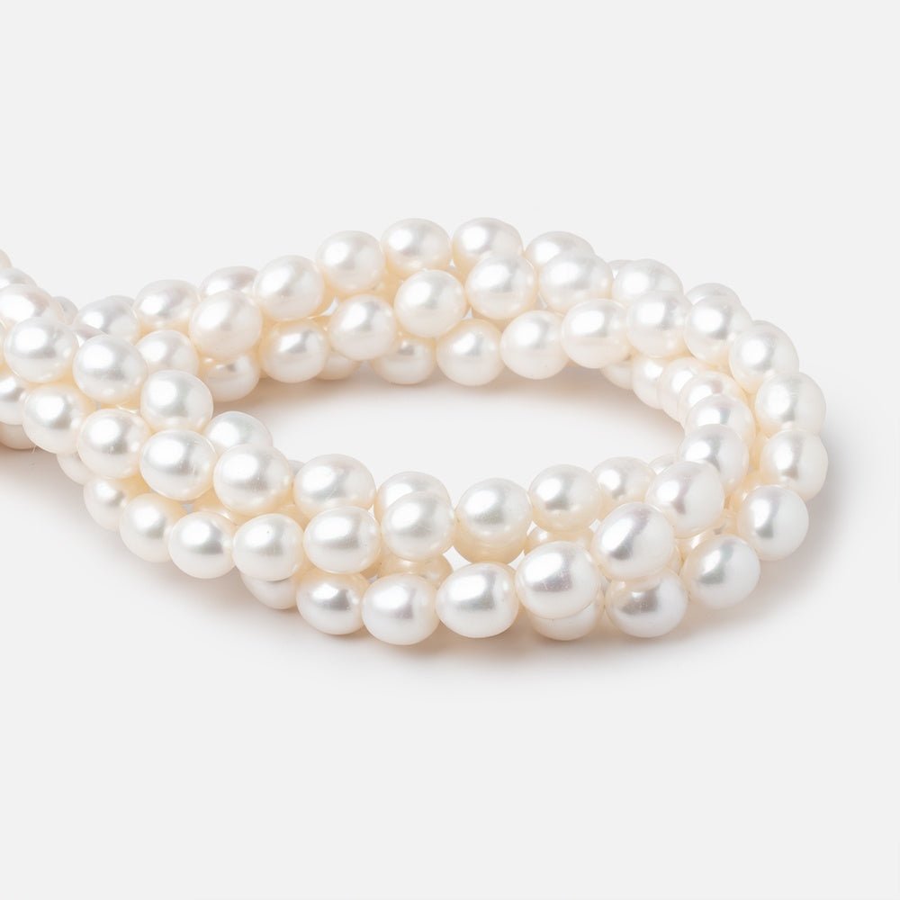 10x8-11x9mm Creamy Straight Drill Oval Freshwater Pearls 16 inch 36 Beads - Beadsofcambay.com