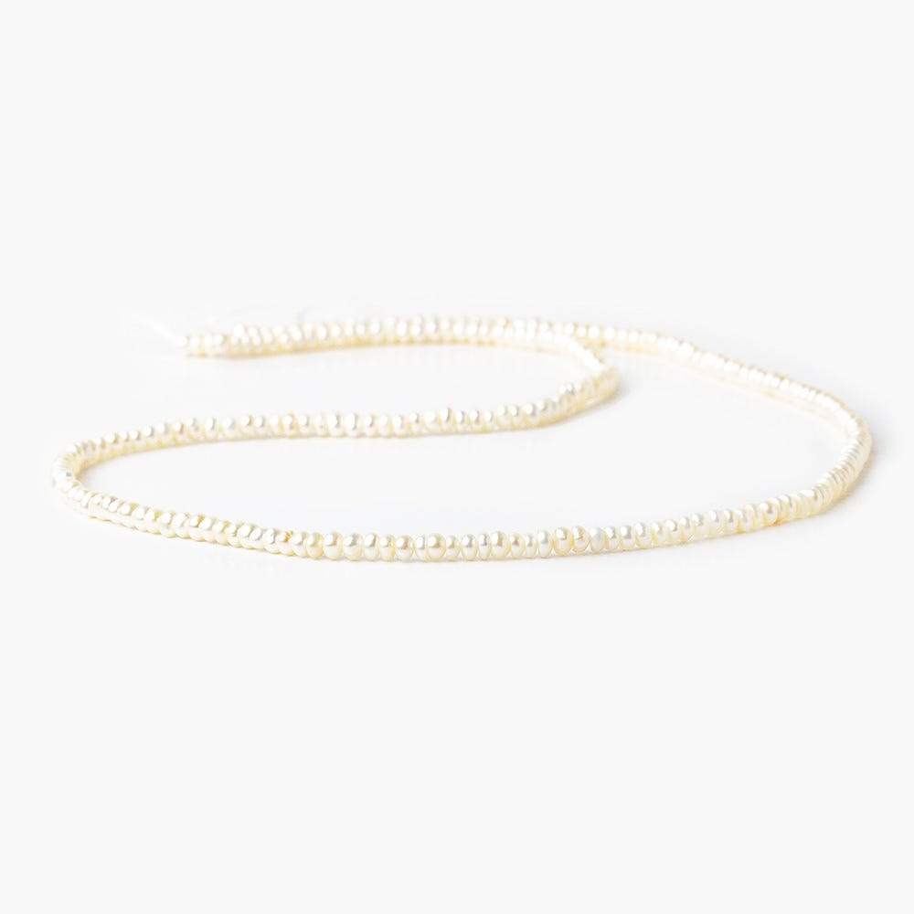 2.5-3mm Off White Center Drilled Button Freshwater Pearl 250 pieces - Beadsofcambay.com