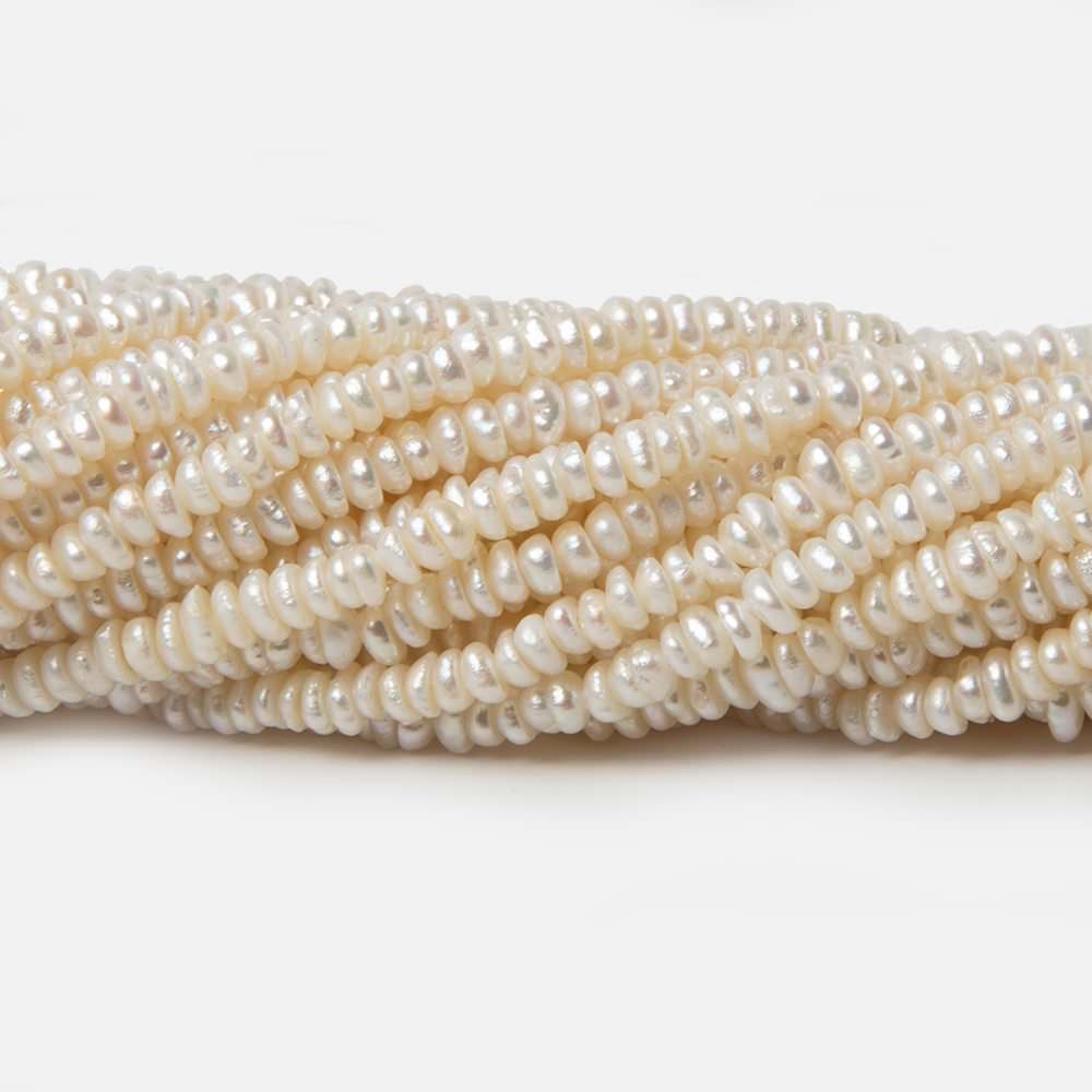 3x2.8mm Off White Center Drilled Baroque Freshwater Pearls 14 inch 245 pieces - Beadsofcambay.com