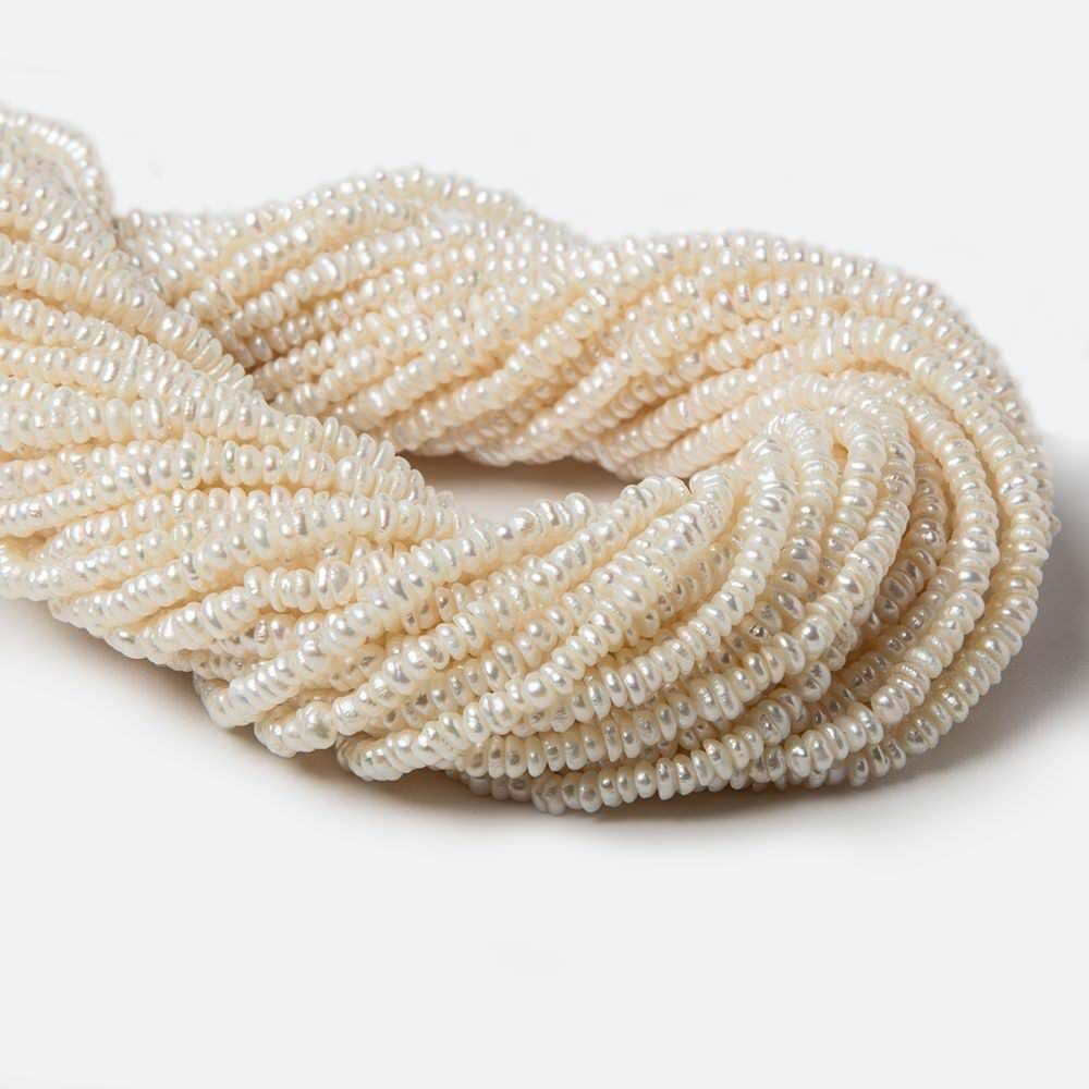 3x2.8mm Off White Center Drilled Baroque Freshwater Pearls 14 inch 245 pieces - Beadsofcambay.com