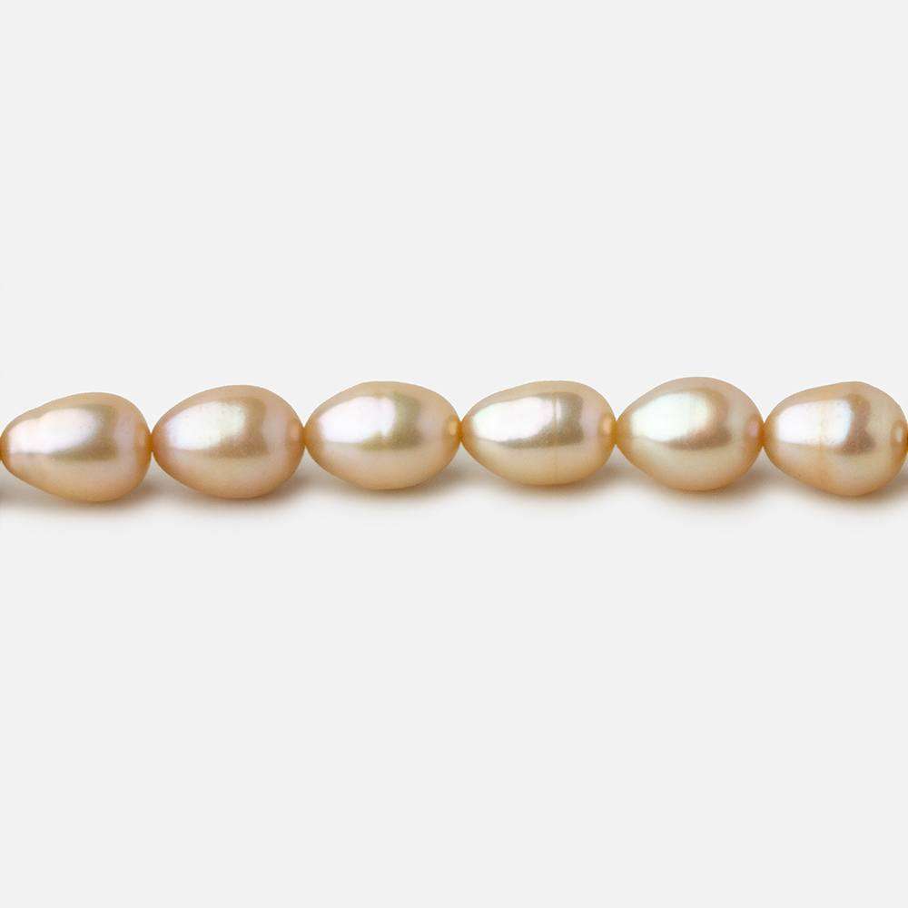 4.5x5.5-5x6.5mm Golden Beige straight drilled Oval freshwater pearls 16 inch 64 pieces A - Beadsofcambay.com