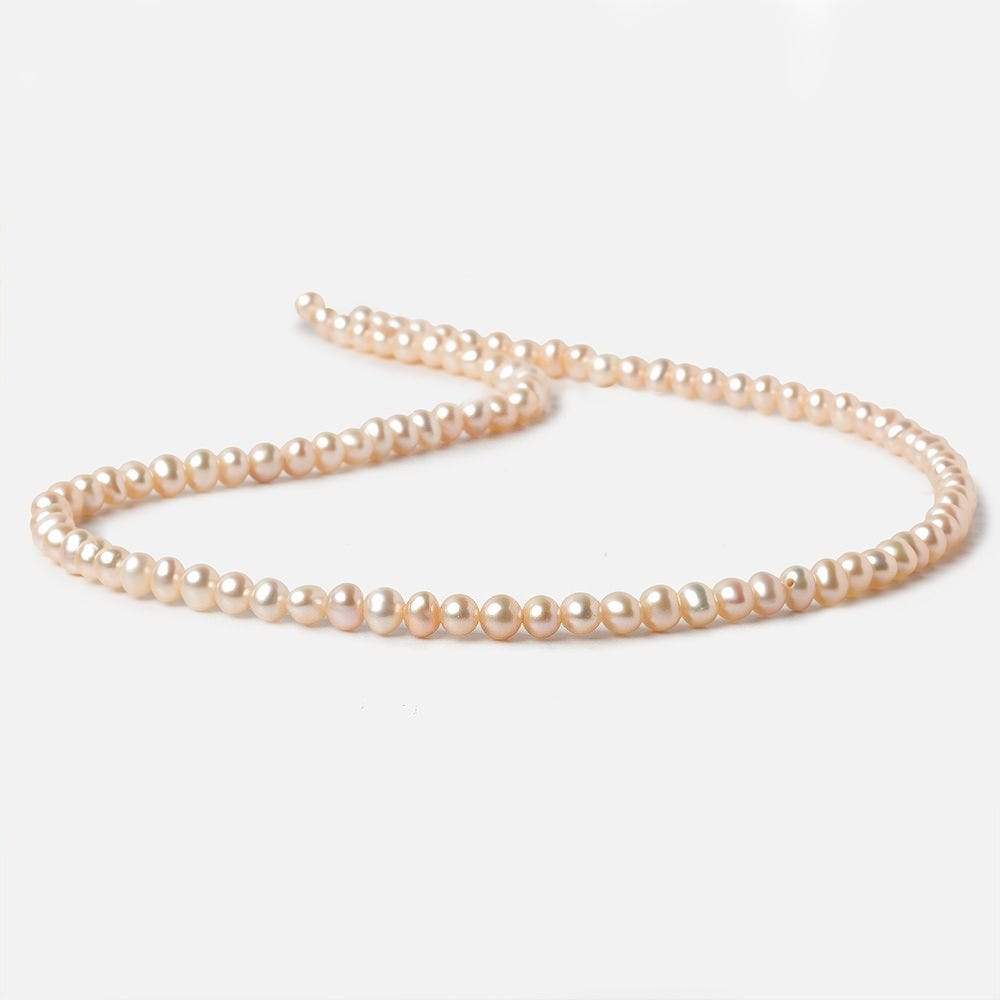 4.5x4mm Peach Side Drilled Off Round Freshwater Pearls 15 inch 98 pieces - Beadsofcambay.com