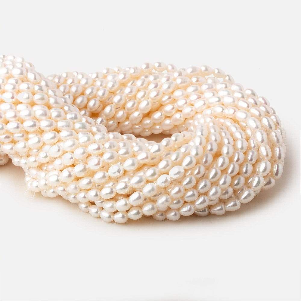 4x5.5-4.5x7mm Off White straight drilled Oval freshwater pearls 15.5 inch 65 pieces A - Beadsofcambay.com