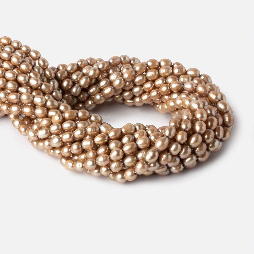 6-7mm Buttery Golden straight drilled oval pearls 15.5 inch 60 pieces - Beadsofcambay.com