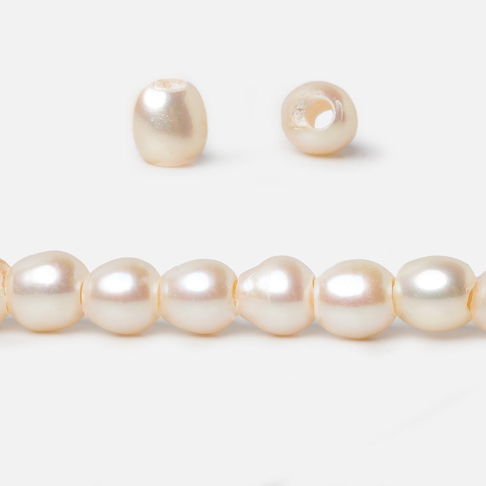 6.5x6.5mm Creamy White Straight Drilled Oval Large Hole pearls 8 inch 30 pieces AA - Beadsofcambay.com