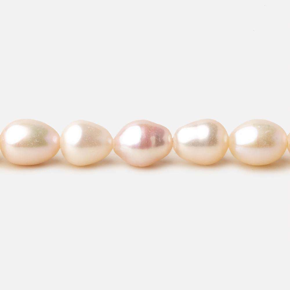 6x7.5.5x8mm Rose' White straight drilled Oval freshwater pearls 15 inch 52 pieces A - Beadsofcambay.com