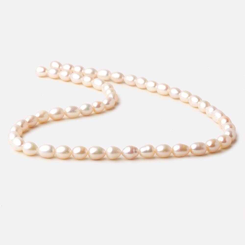 6x7.5.5x8mm Rose' White straight drilled Oval freshwater pearls 15 inch 52 pieces A - Beadsofcambay.com