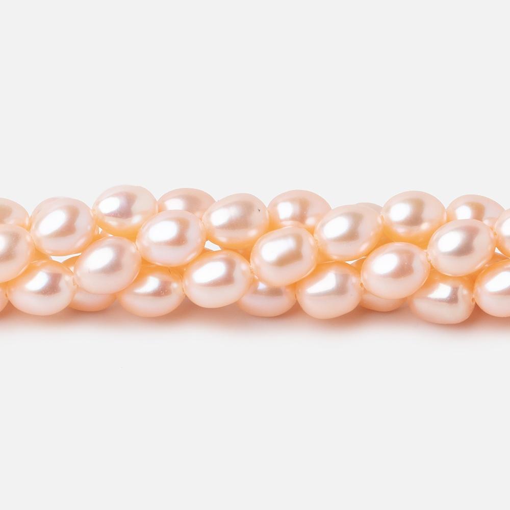 7x5mm Peach Straight Drill Oval Freshwater Pearl 15 inch 56 pcs - Beadsofcambay.com
