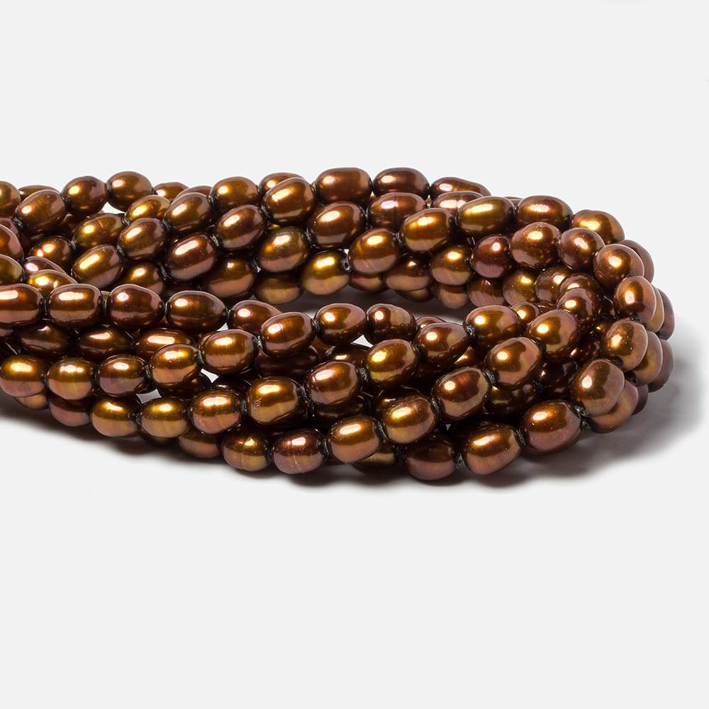 8x5mm Chocolate Brown straight drilled oval pearls 16 inch 55 pieces - Beadsofcambay.com