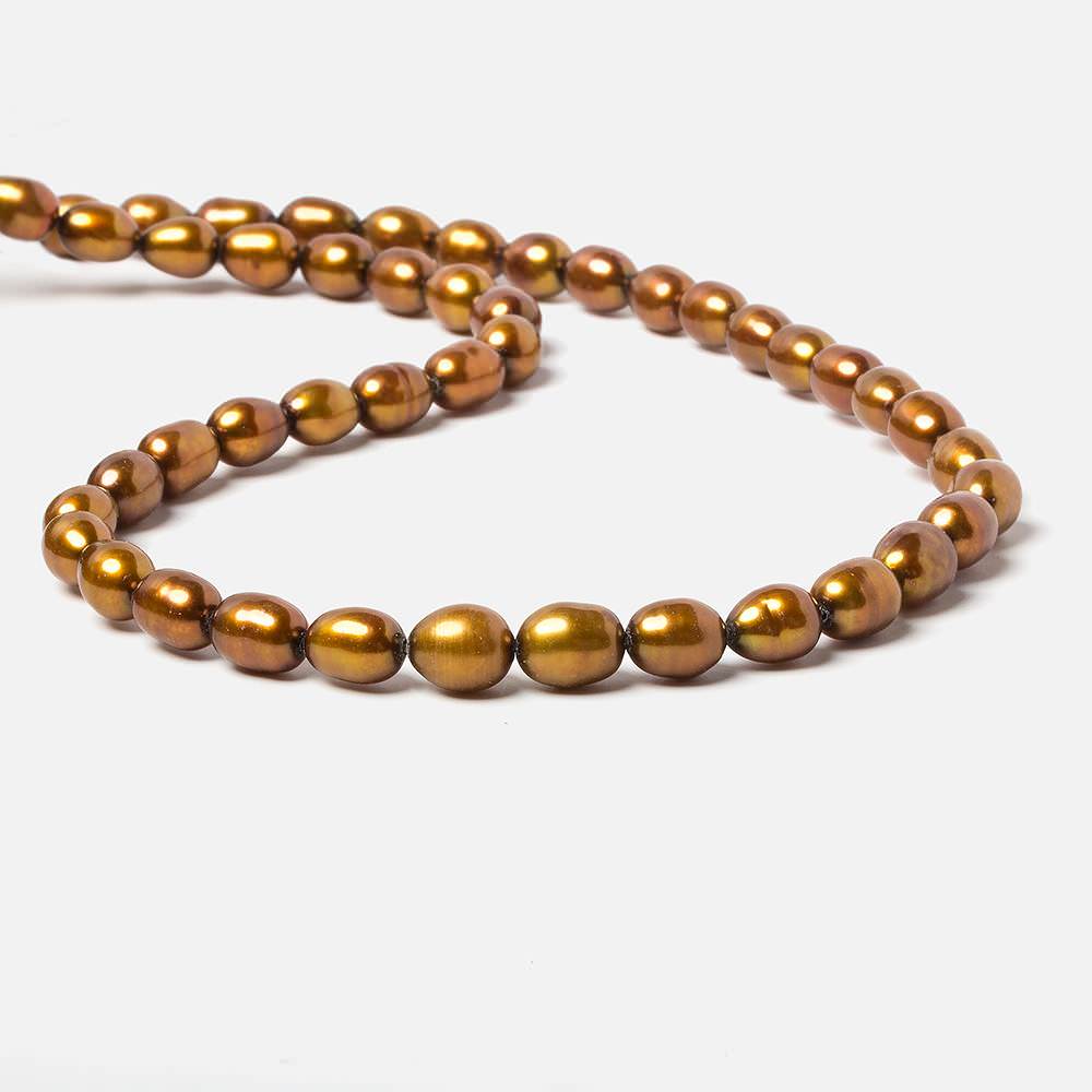 8x5mm Golden straight drilled oval pearls 16 inch 55 pieces - Beadsofcambay.com