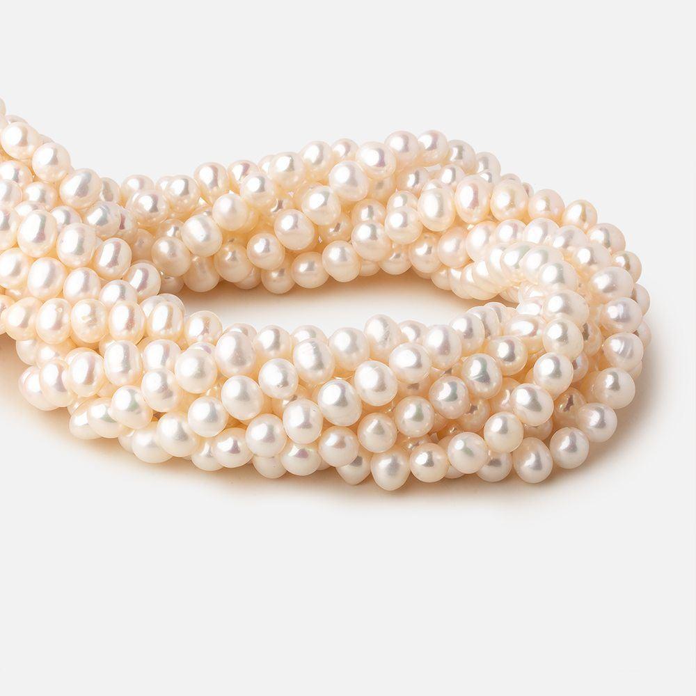 8x7mm Off White side drilled Baroque freshwater pearls 15.5 inch 55 pieces A - Beadsofcambay.com