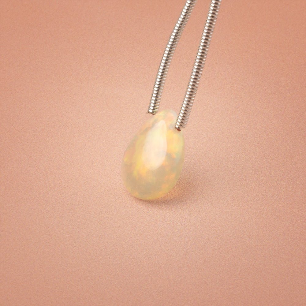 10 - 11mm Ethiopian Opal Plain Pear 1 Focal Bead AAA - Beadsofcambay.com