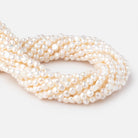 5-6mm Cream Baroque 2mm Large Hole Pearls 15 inch 64 pieces - BeadsofCambay.com