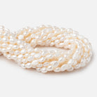 7x6.5-10x7mm Creamy White Baroque Freshwater Pearl 16 inch 35 Beads - BeadsofCambay.com