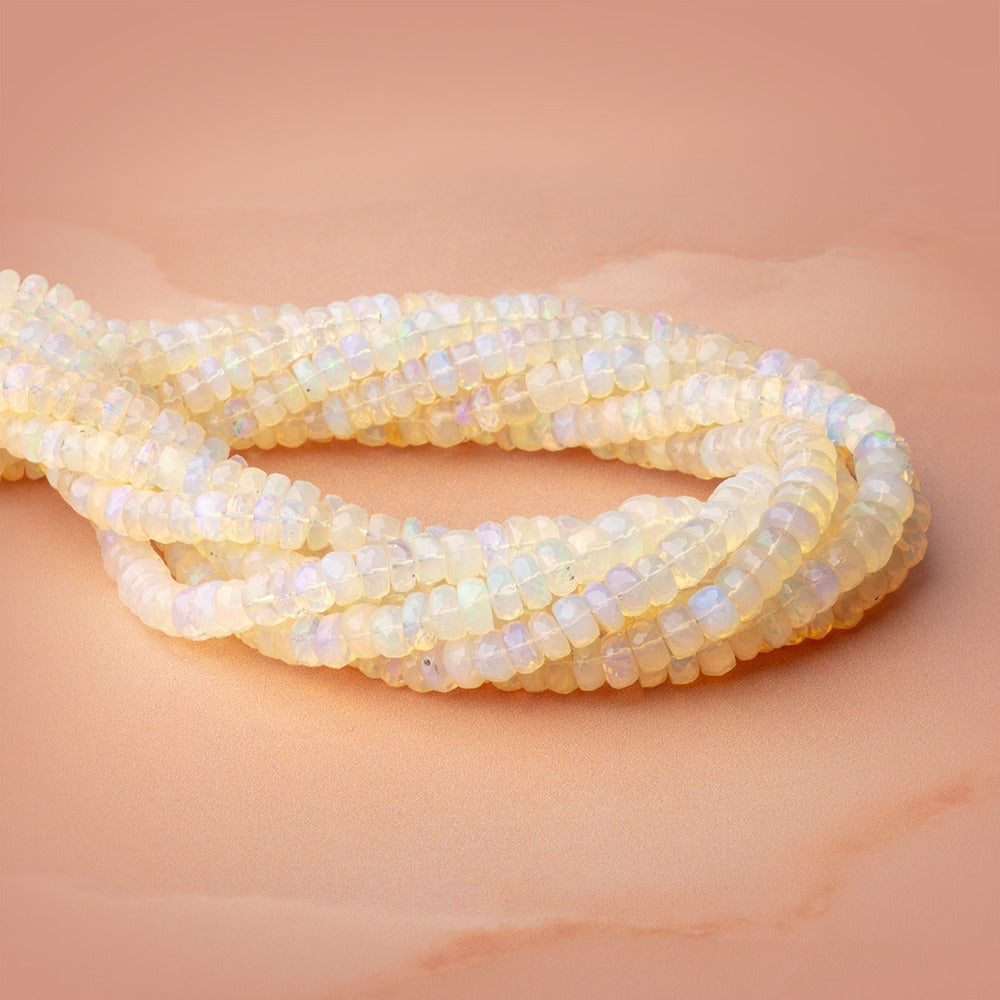 5.5-7mm Ethiopian Opal Faceted Rondelle Beads 18 inch 140 pieces AAA - BeadsofCambay.com