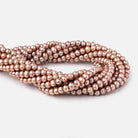 6x5-7x5mm Rose Champagne Off Round Large Hole Freshwater Pearl 15 inch 75 pieces - BeadsofCambay.com