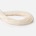 3 - 3.5mm Creamy Petite Baroque Freshwater Pearls 14.75 inch 100 Beads AA - Beadsofcambay.com