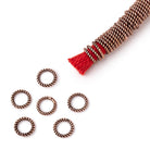 8mm Twisted Jump Rings on an 8 inch Strand - BeadsfCambay.com