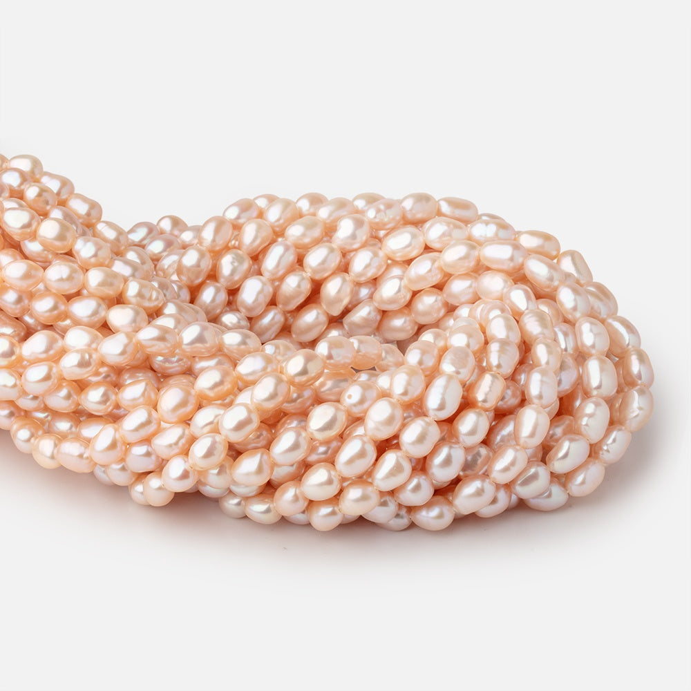 8-10mm Coral Pink Baroque Freshwater Pearls 15 inch 45 Beads - BeadsofCambay.com