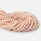 8-10mm Coral Pink Baroque Freshwater Pearls 15 inch 45 Beads - BeadsofCambay.com