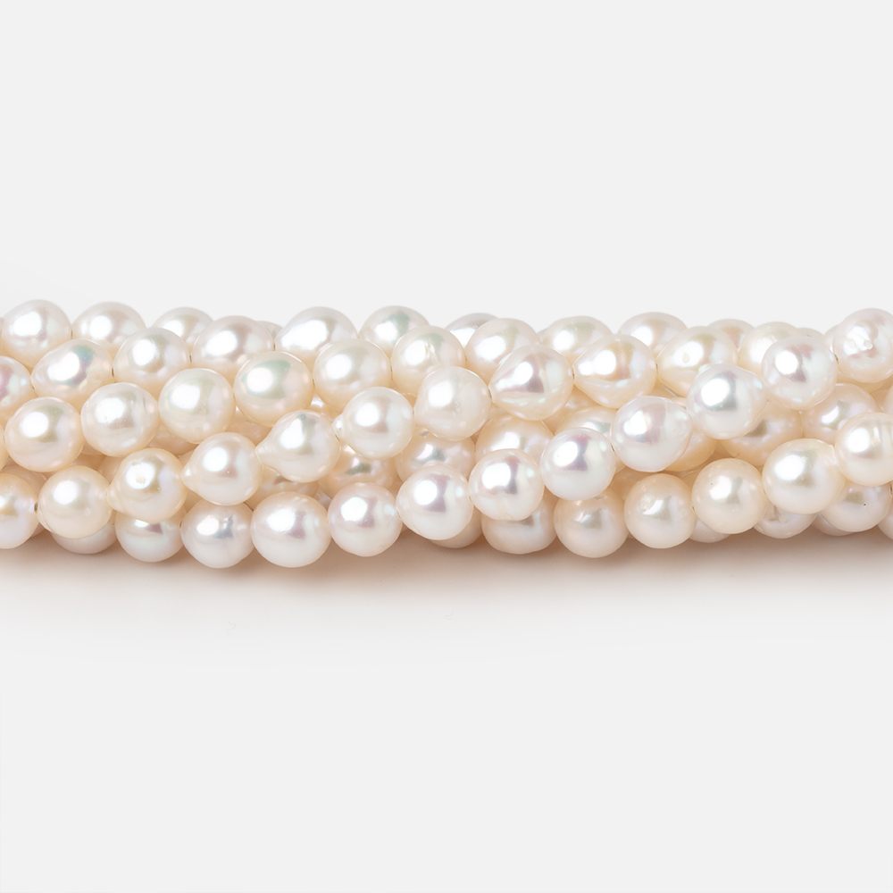 5 - 5.5mm Creamy White Petite Baroque Freshwater Pearls 15 inch 70 Beads - Beadsofcambay.com
