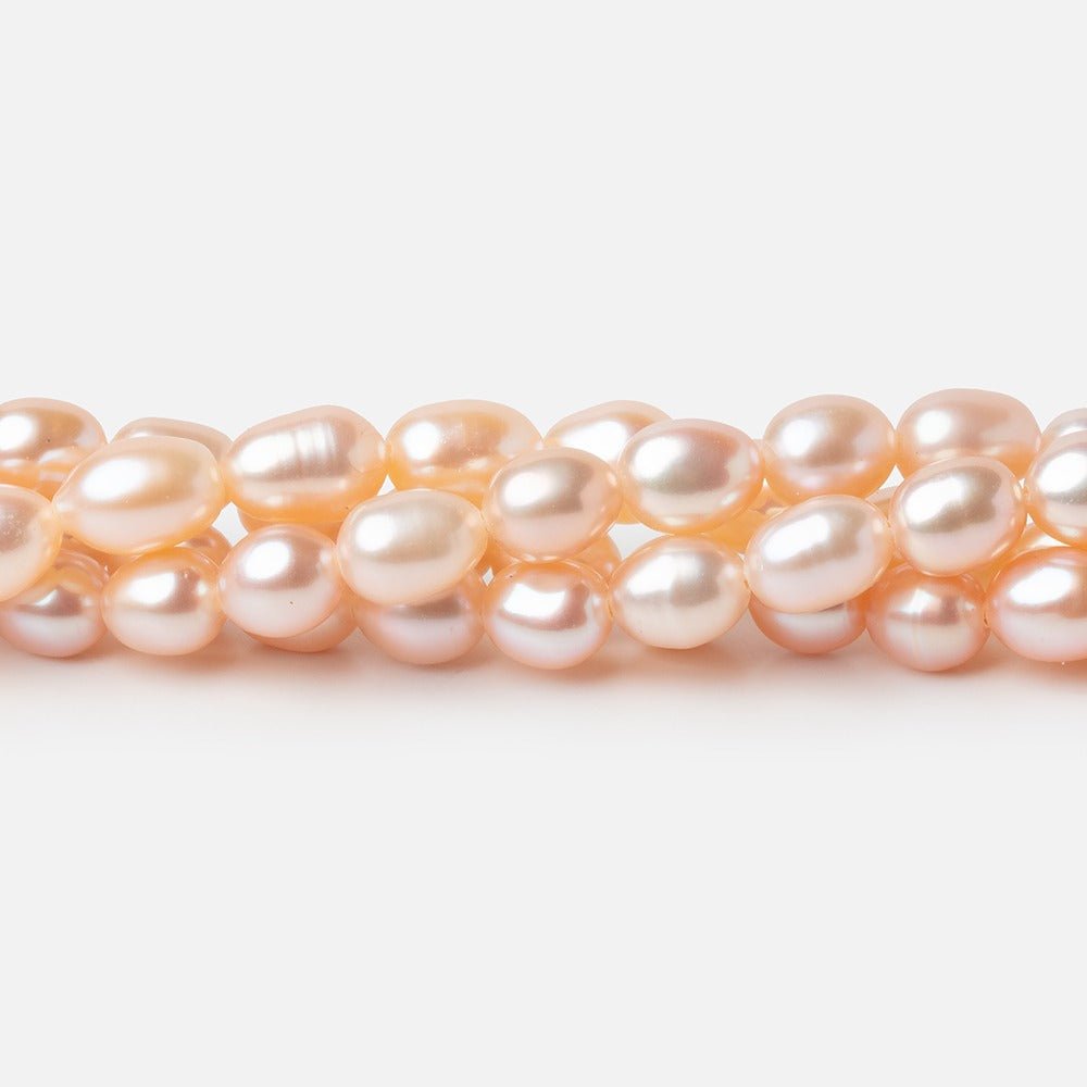 5 - 5.5mm Peach Petite Oval Freshwater Pearls 15.75 inch 75 Beads - Beadsofcambay.com