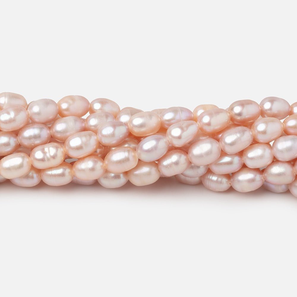 5-6mm Pink Straight Drill Oval Freshwater Pearls 15.5 inch 66 Beads - Beadsofcambay.com