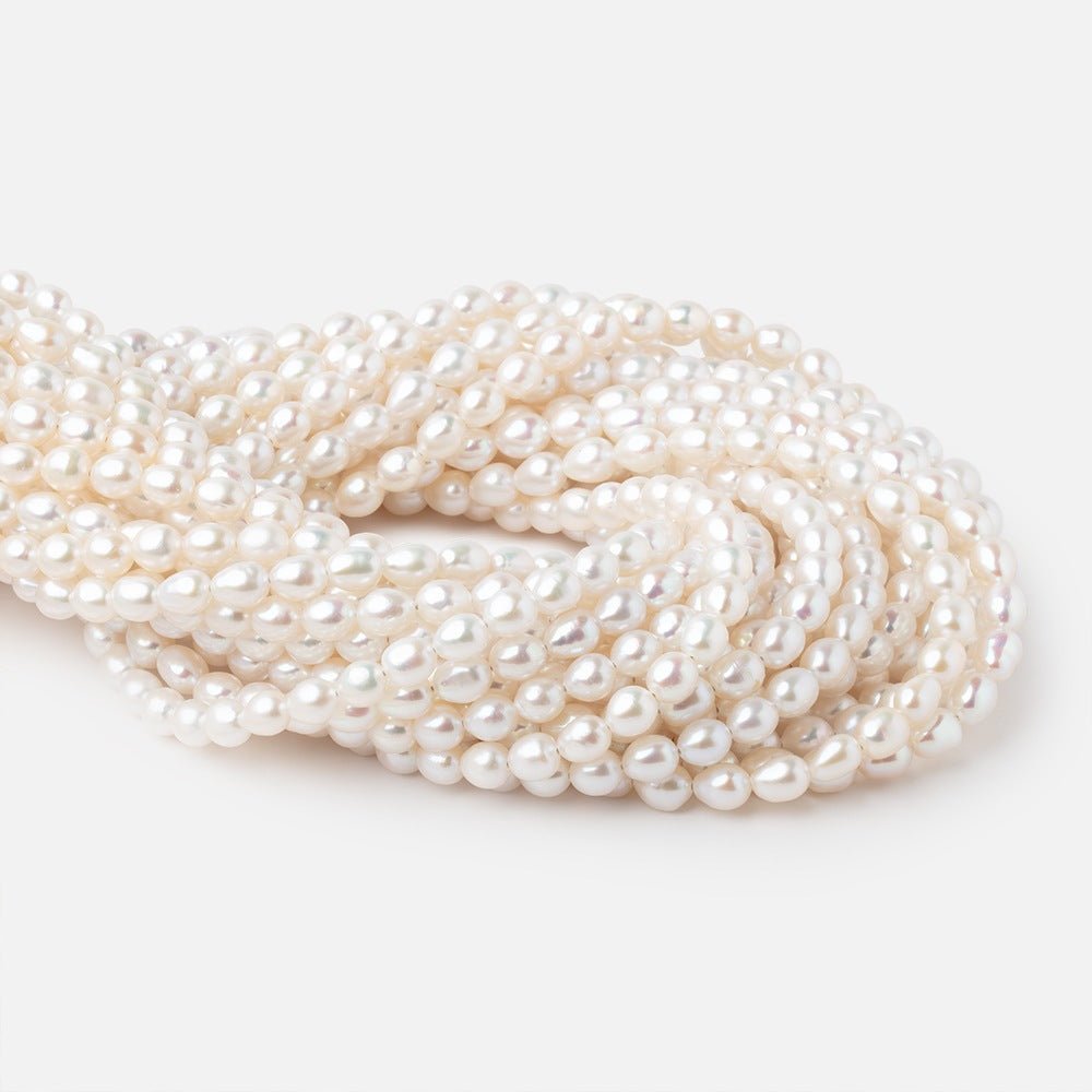 5.5 - 7mm Creamy White Baroque Freshwater Pearls 15 inch 60 Beads AAA - Beadsofcambay.com