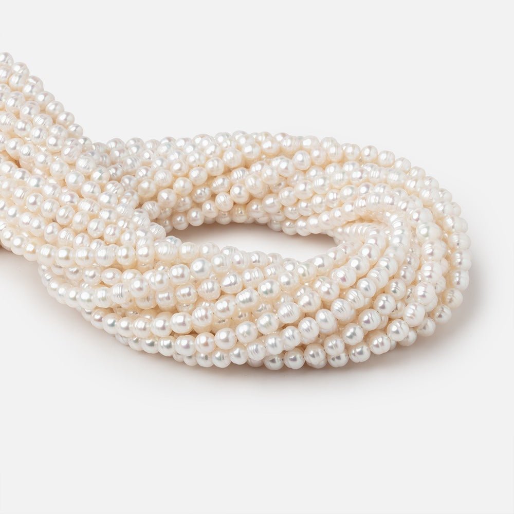 5.5mm Creamy White Ringed Baroque Freshwater Pearls 15 inch 68 Beads - Beadsofcambay.com