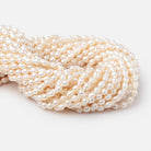 6-6.5mm Creamy Petite Ultra Baroque Freshwater Pearls 16 inch 66 Beads - Beadsofcambay.com