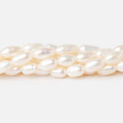 6.5 - 9mm Creamy White Oval Freshwater Pearls 15 inch 40 Beads - Beadsofcambay.com