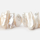 7x6 - 20x8mm Creamy White Biwa Freshwater Pearls 15.5 inch 57 beads AAA - Beadsofcambay.com