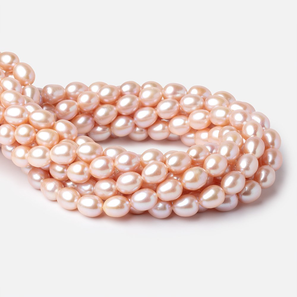 9 - 11mm Petal Pink Oval Freshwater Pearls 16 inch 36 Beads - Beadsofcambay.com