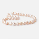 9.5 - 10.5mm Peach Baroque Freshwater Pearls 15.5 inch 35 Beads - Beadsofcambay.com