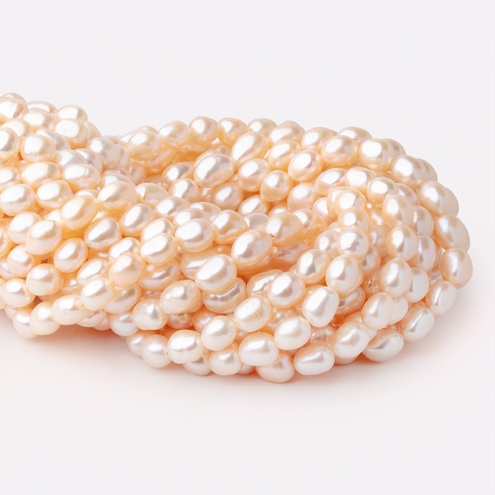 9.5 - 10.5mm Peach Baroque Freshwater Pearls 15.5 inch 35 Beads - Beadsofcambay.com