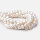 9.5-11mm Off White Near Round Freshwater Pearls 15.75 inch 40 Beads - Beadsofcambay.com