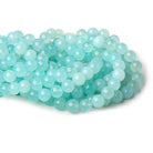 10.5-11mm Sky Blue Chalcedony Plain Rounds 12.5 inch 30 beads - Beadsofcambay.com