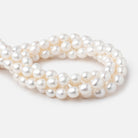 10x8-11x9mm Creamy Straight Drill Oval Freshwater Pearls 16 inch 36 Beads - Beadsofcambay.com