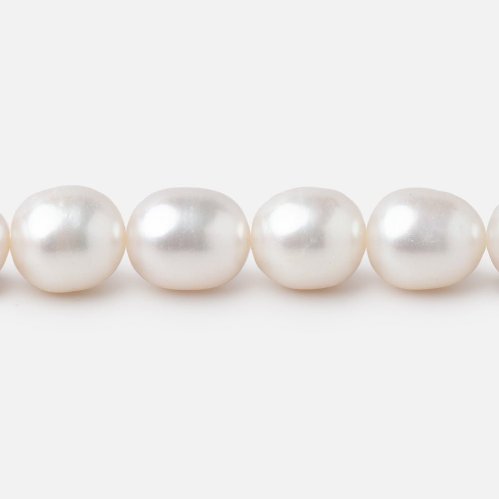 10x8-11x9mm Creamy Straight Drill Oval Freshwater Pearls 16 inch 36 Beads - Beadsofcambay.com