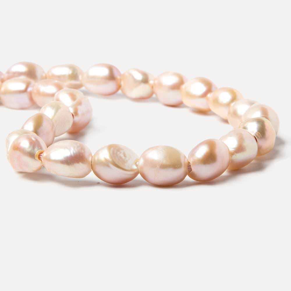 11x9-13x10.5mm Bridal Peach Baroque 2.5mm large hole Pearls 15 in. 33 pcs - Beadsofcambay.com