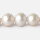 12.5x12.5-15.5x14.5mm White Near Round Freshwater Pearl 16.5 inch 32 pieces A - Beadsofcambay.com