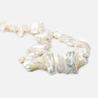 12x6-20x7mm Off White Biwa Side Drilled Freshwater Pearls 14.5 inch 47 pcs - Beadsofcambay.com