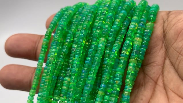 Beadsofcambay 2-4.5mm Lime Green Ethiopian Opal Plain Rondelle Beads 17 inch 245 pieces View 1