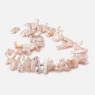 13x6-19x6mm Peach Biwa Freshwater Pearls 15.5 inch 60 beads AA - Beadsofcambay.com