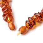15x10-23x17mm Baltic Amber Plain Nugget Beads 20 inch 90 pieces - Beadsofcambay.com